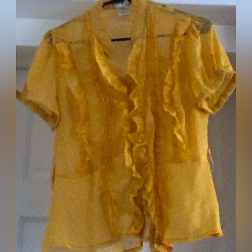 Mustard Yellow mesh shirt with buttons down the front.